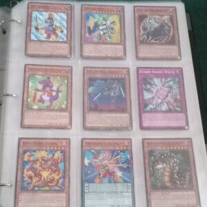 LOW PRICE $5 - Sleeve of 9 assorted 1st edition YuGiOh cards with a bit of wear